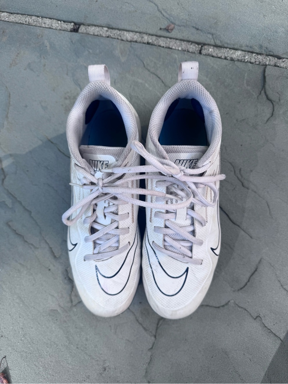 Nike White Athletic Sneakers with Black Swoosh
